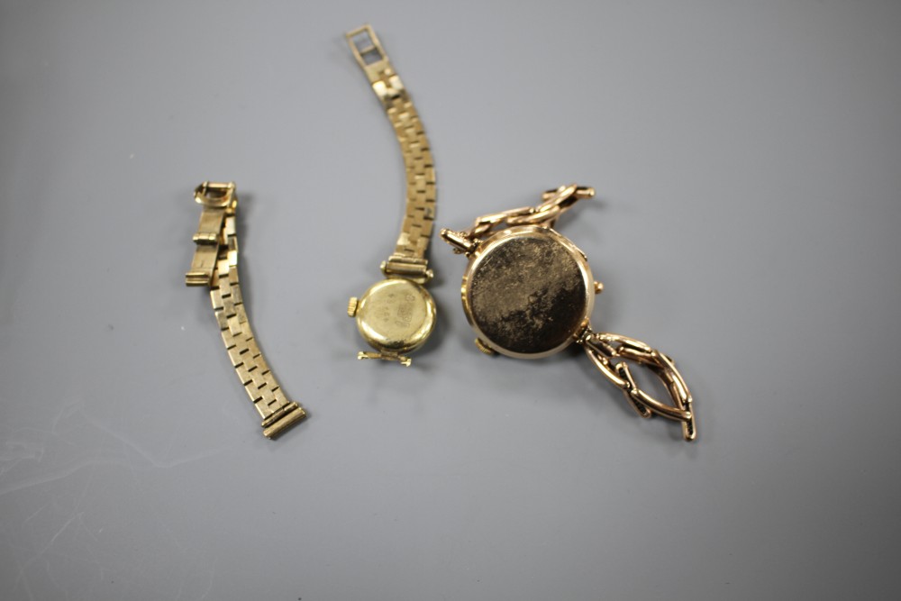 A ladys 1930s? 9ct gold manual wind wrist watch, on yellow metal flexible strap and a 14ct gold watch on damaged strap.